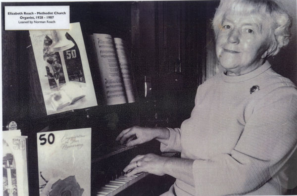 Copy of a photograph of Elizabeth Roach playing the organ at the Methodist Church Llangwm Pembrokeshire. Elizabeth Roach played the organ between 1928 and 1987